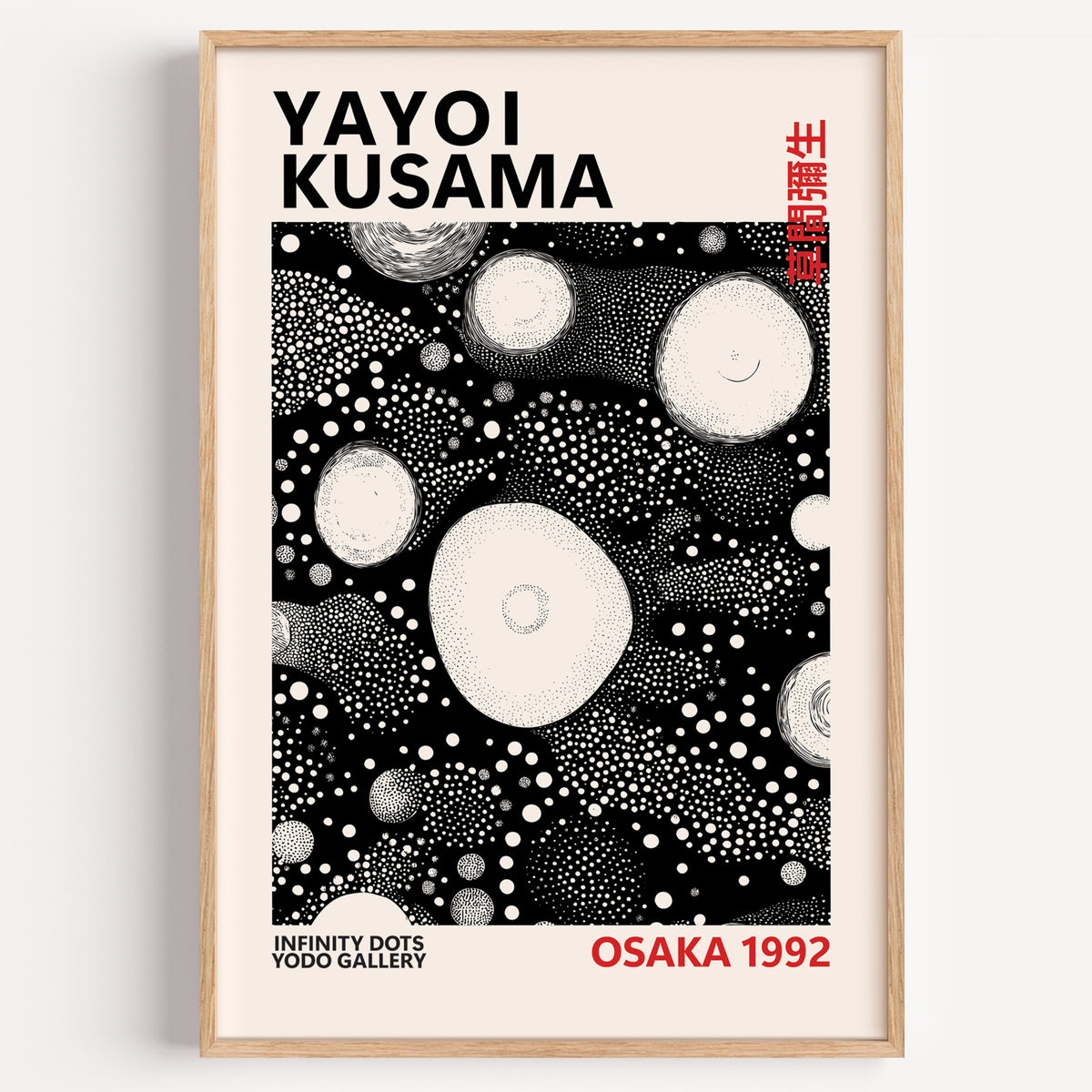 Yayoi Kusama inspired white orbs on black print in a wood frame on a plain wall