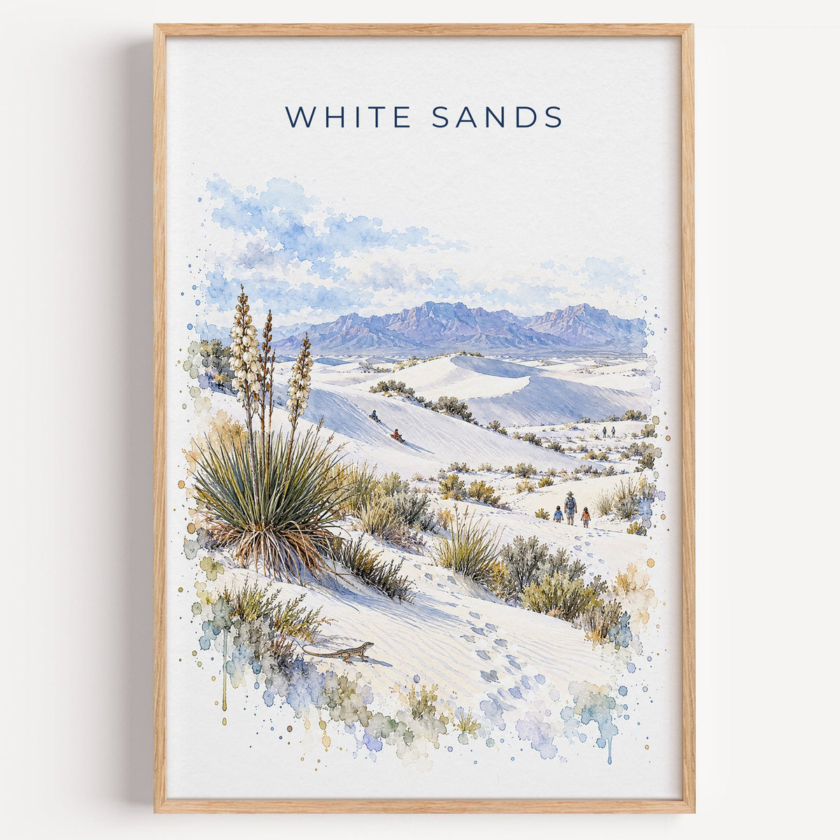 White Sands National Park watercolor print in a light oak frame on a plain white wall