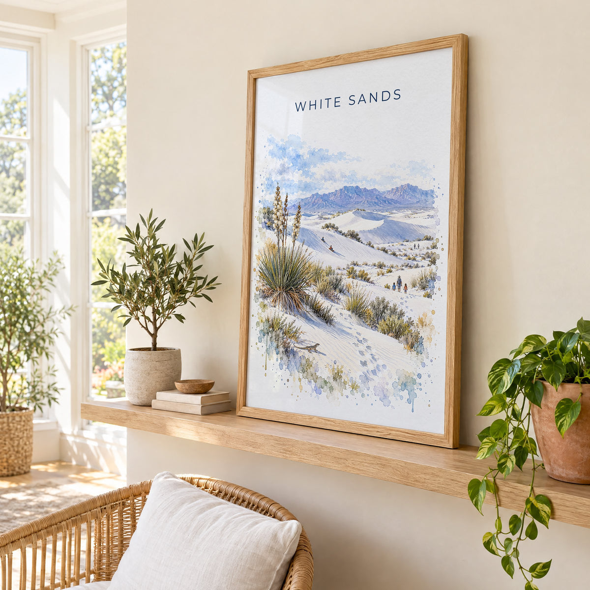 White Sands National Park watercolor print in an oak frame on a picture ledge in a sunlit sunroom