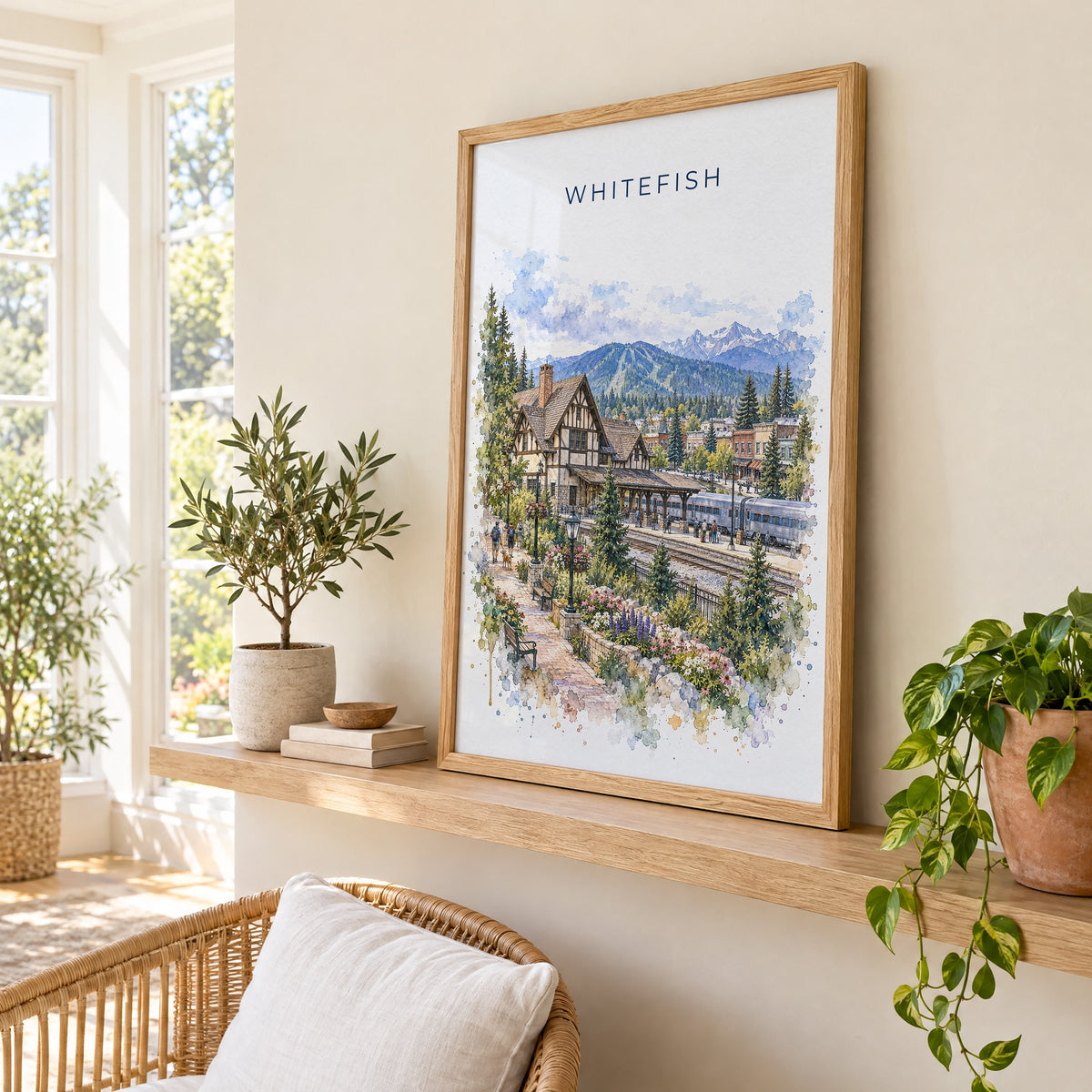Whitefish watercolor print in an oak frame on a picture ledge in a sunlit sunroom