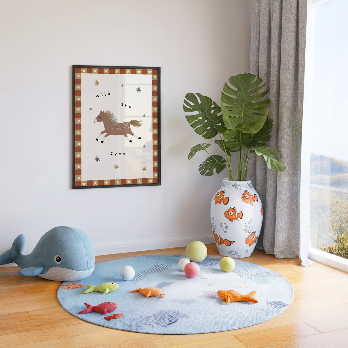 Wild and free pony nursery print in a black frame in a playroom with an ocean rug and whale plush