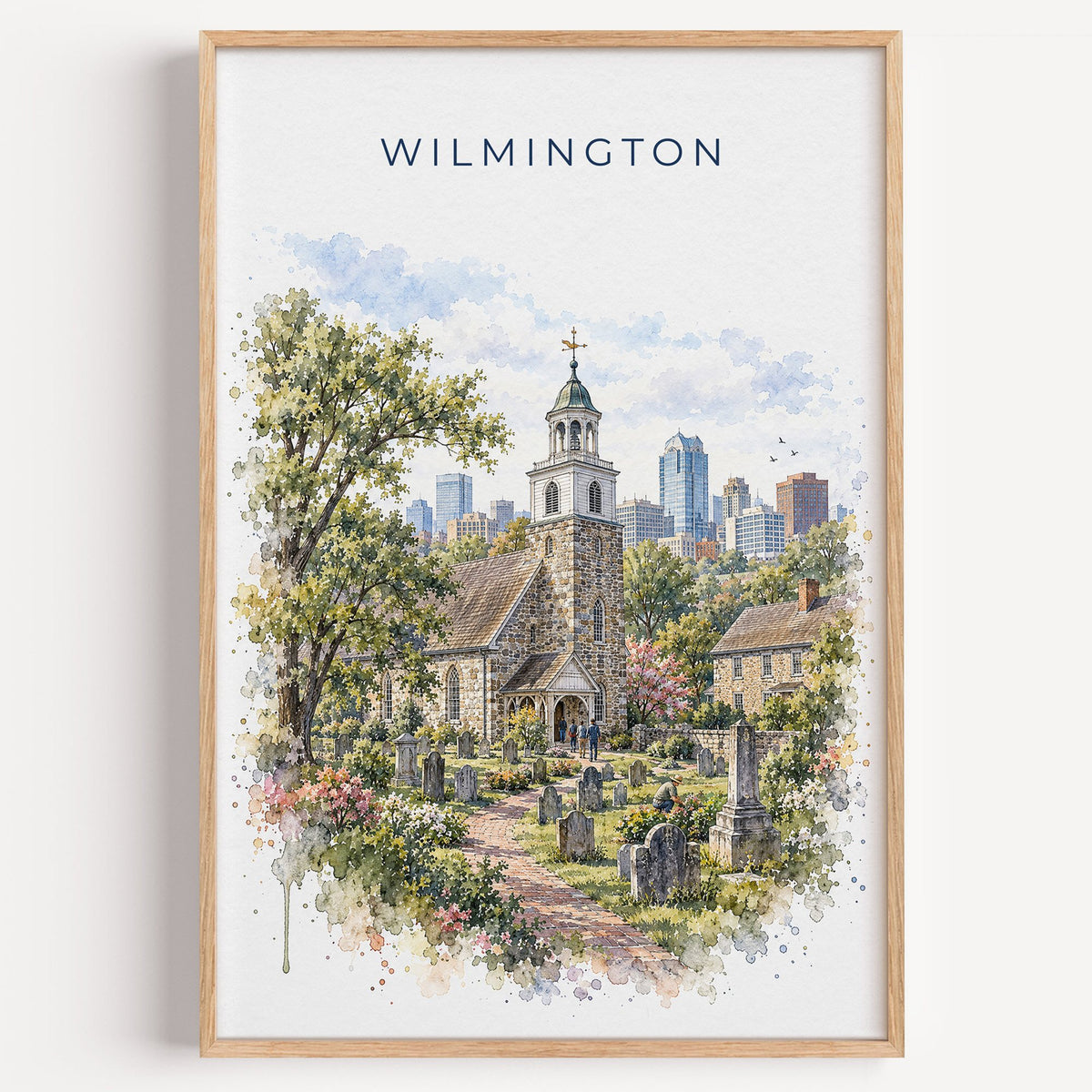 Wilmington, Delaware watercolor print in a light oak frame on a plain white wall