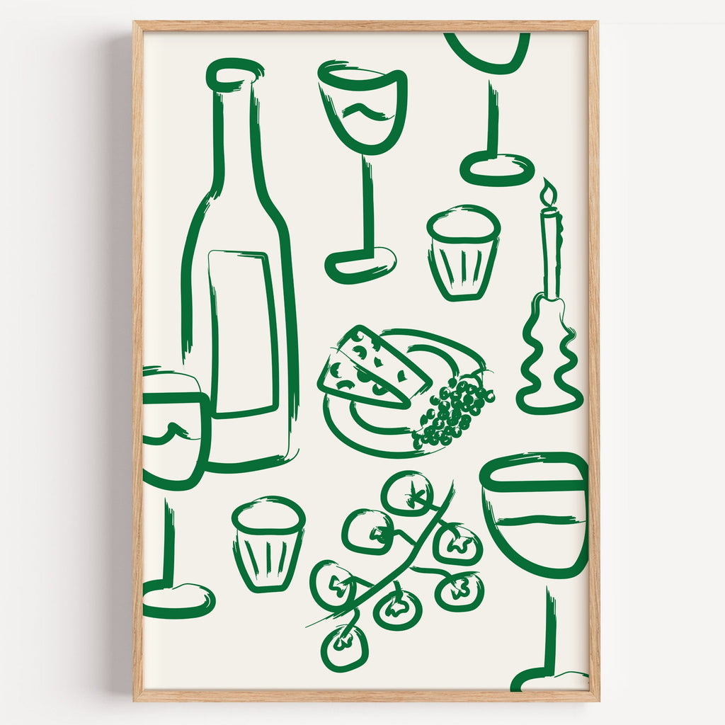 Wine and cheese green pattern print in a light oak frame on a plain white wall