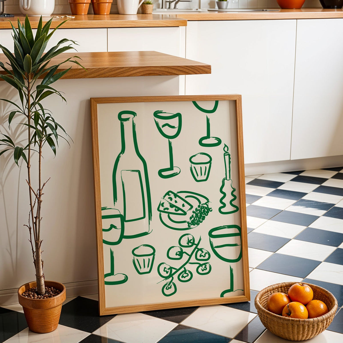 Wine and cheese green pattern print in an oak frame by a kitchen island