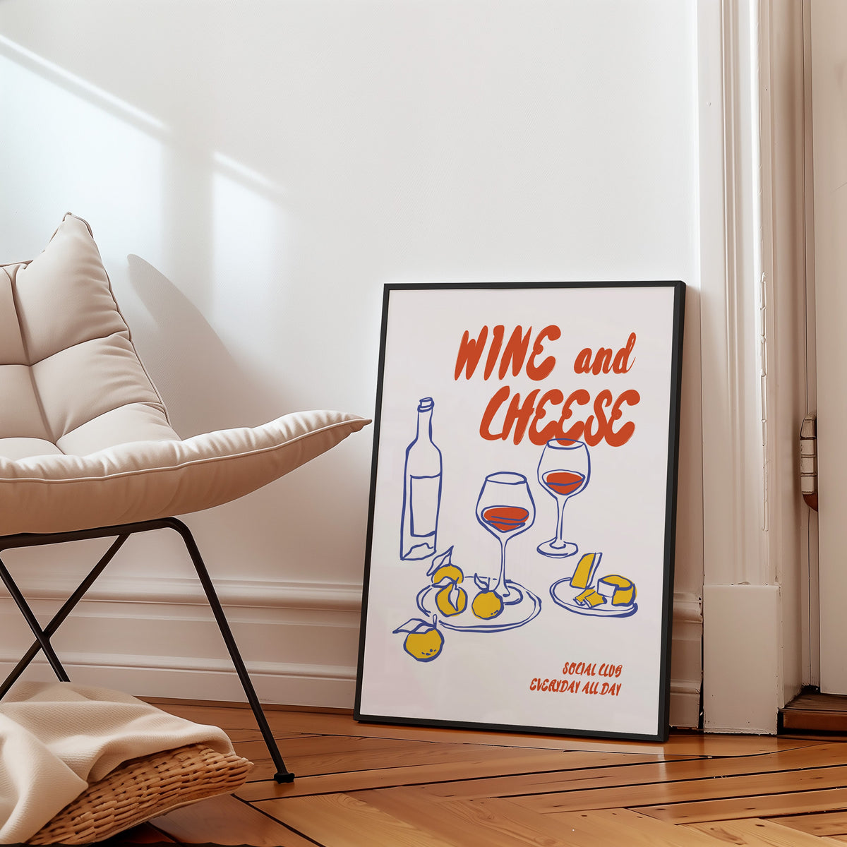 Wine and Cheese lemons print in a black frame on a parquet floor