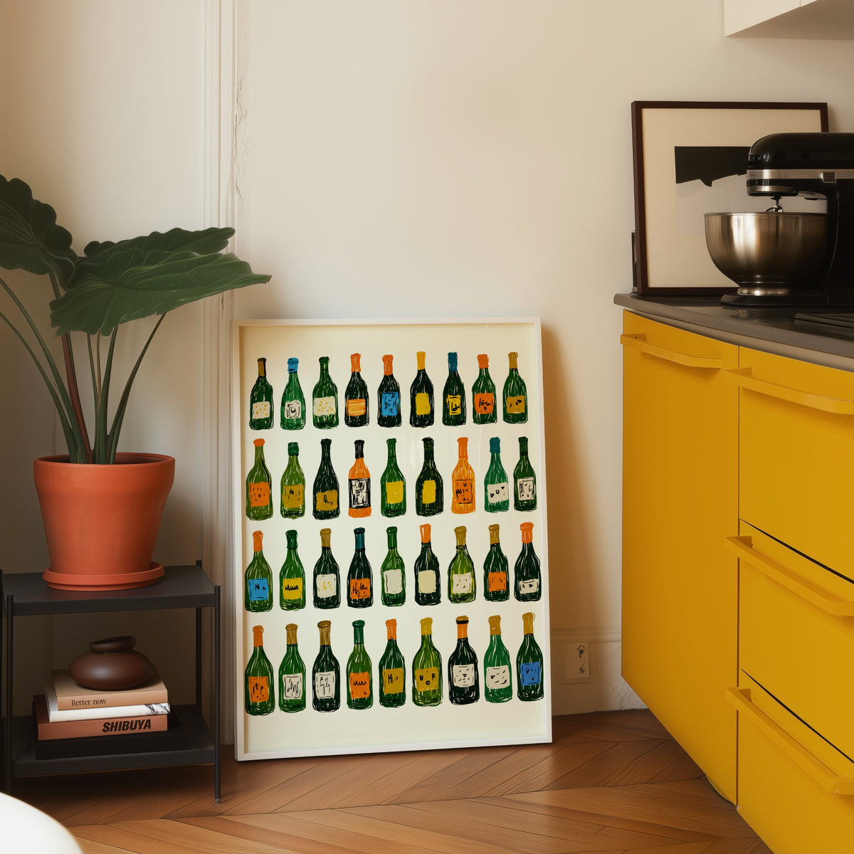 Wine bottle grid print in a white frame on parquet beside a bright yellow kitchen