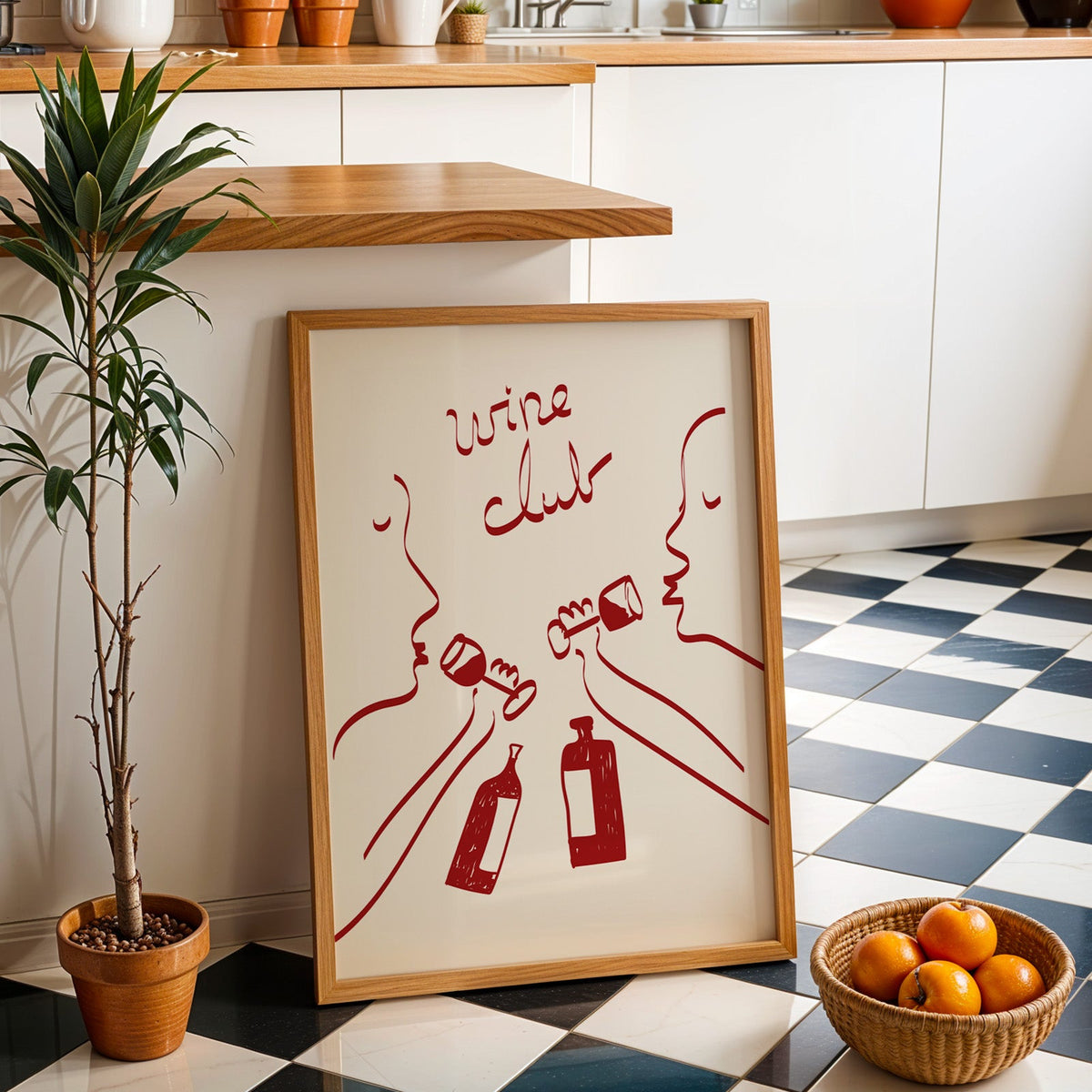 Wine club faces line art print in an oak frame by a kitchen island