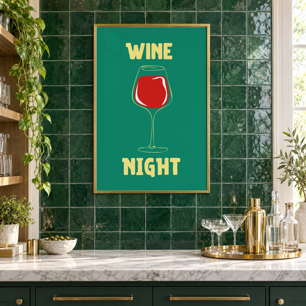 Wine Night red glass print in a brass frame on emerald green tiles above a home bar with coupe glasses