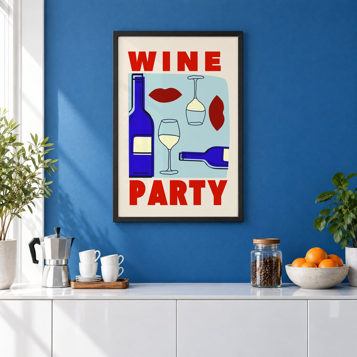 Wine Party bottles and red lips print in a black frame on a cobalt blue wall above a coffee station
