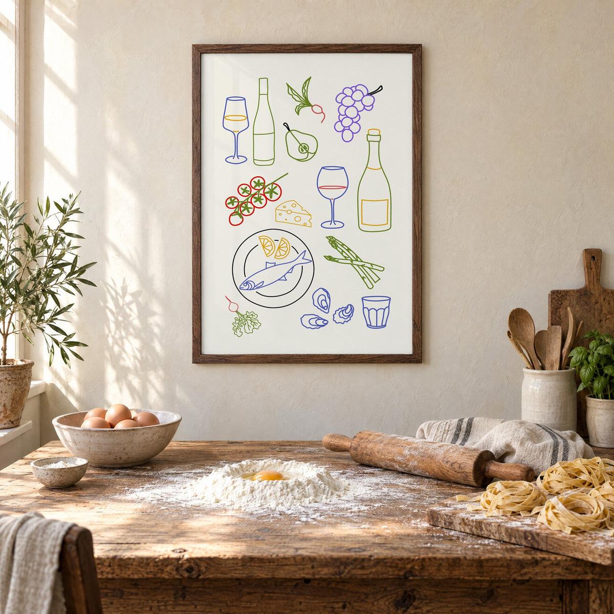 Colorful wine picnic line art print in a walnut frame above a rustic table set for making fresh pasta