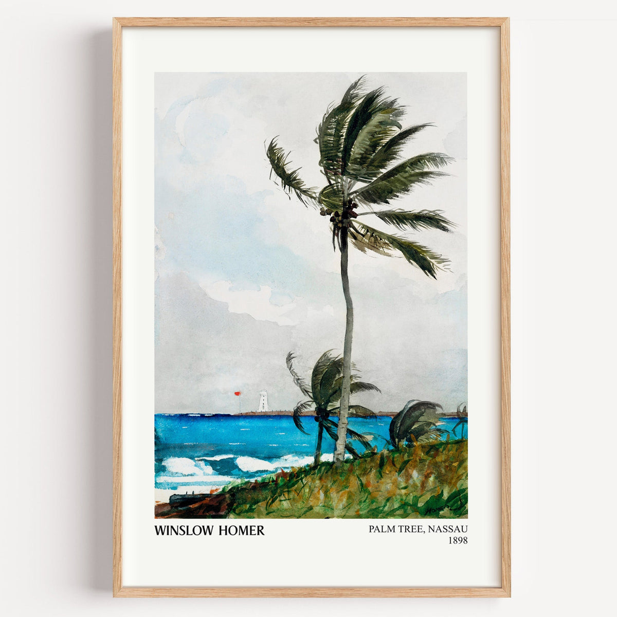 Winslow Homer Palm Tree Nassau print in a light oak frame on a white wall