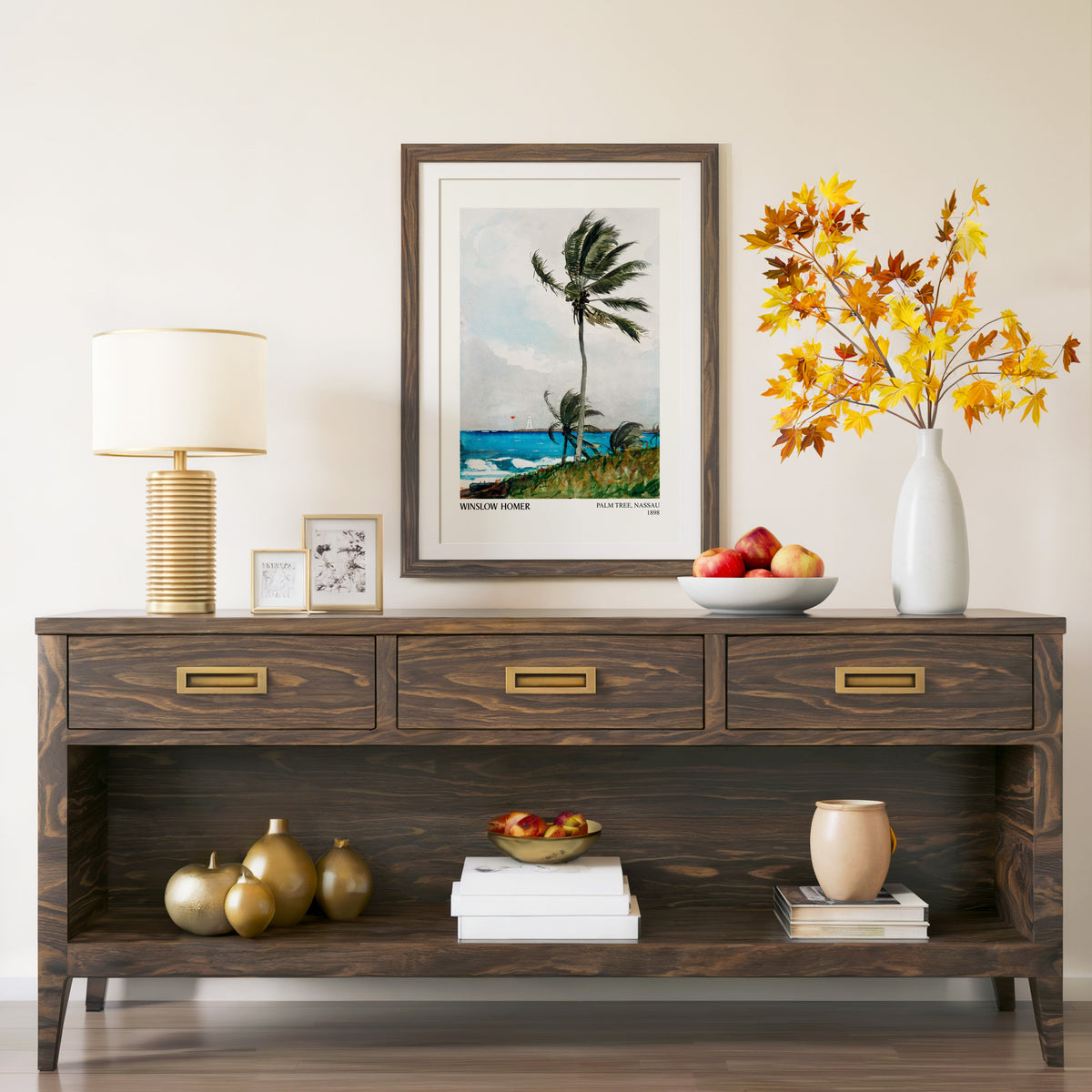 Palm Tree Nassau print in a walnut frame above a console with autumn branches