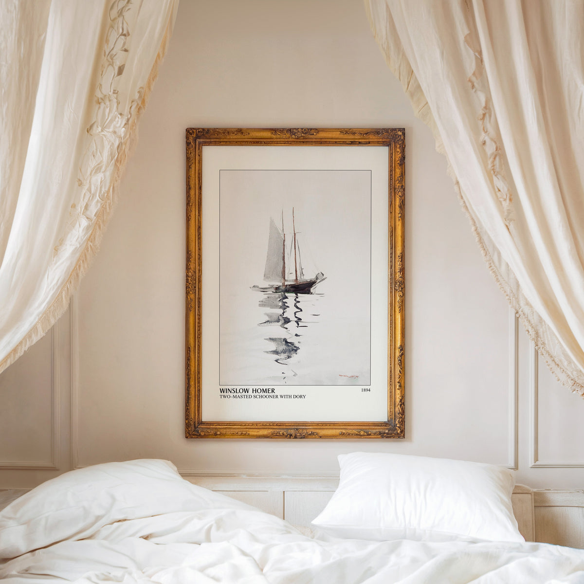 Two-Masted Schooner print shown in an ornate gold frame above a canopy bed