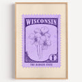 Wisconsin state flower stamp print in violet on lavender, light oak frame on a plain white wall