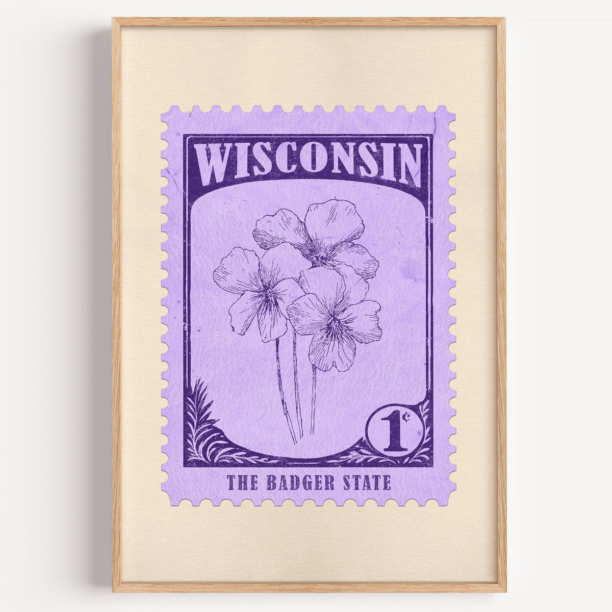 Wisconsin state flower stamp print in violet on lavender, light oak frame on a plain white wall