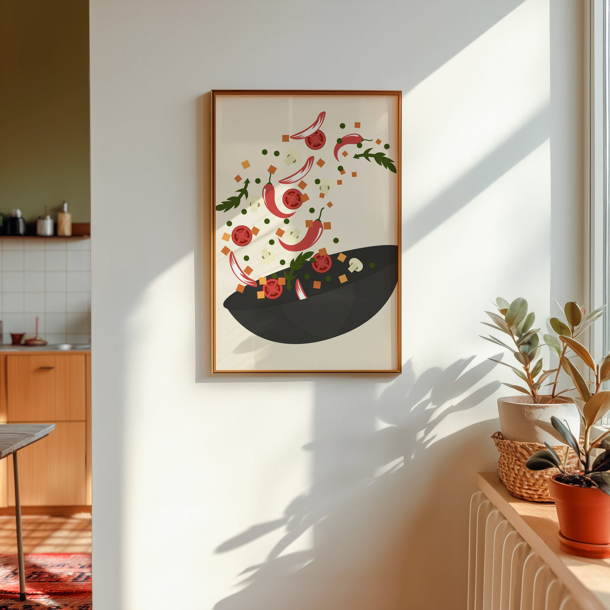 Wok toss print shown in a gold frame in sunlight with plants and a kitchen beyond