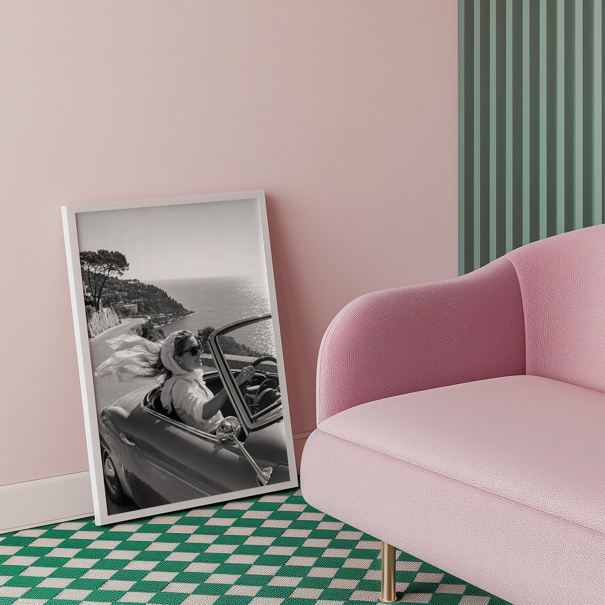 Woman driving a convertible with flowing scarf print in a white frame beside a pink armchair on a checkered floor