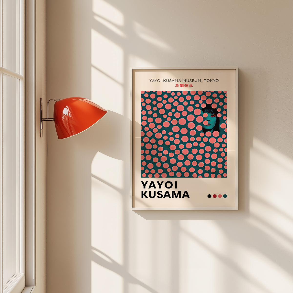 Yayoi Kusama inspired pink dots portrait print in a white frame by a red wall lamp