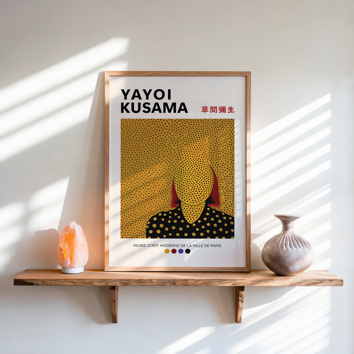 Yayoi Kusama inspired gold dots portrait print above a shelf with a salt lamp