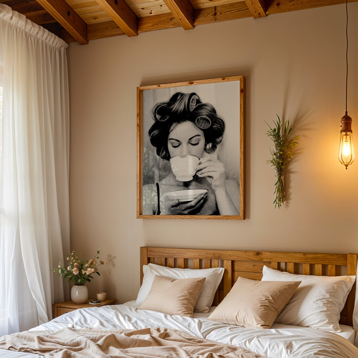Woman in hair rollers sipping from a teacup print in a pine frame above a wood headboard bed under a pendant bulb