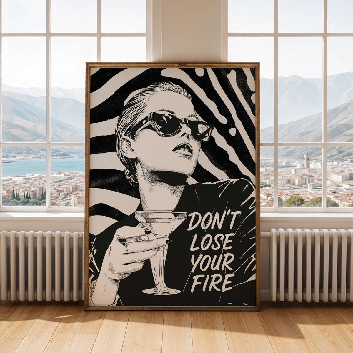 Woman with martini on zebra stripe backdrop ink print shown in an antique gold frame by tall windows with a sea view