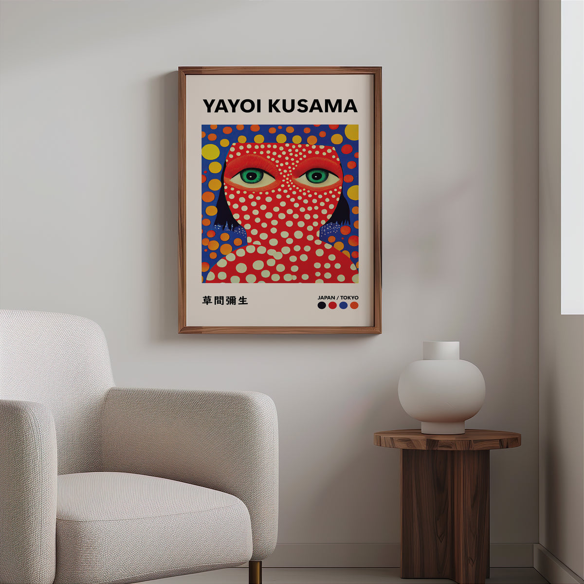 Yayoi Kusama inspired red face green eyes print above a cream boucle armchair