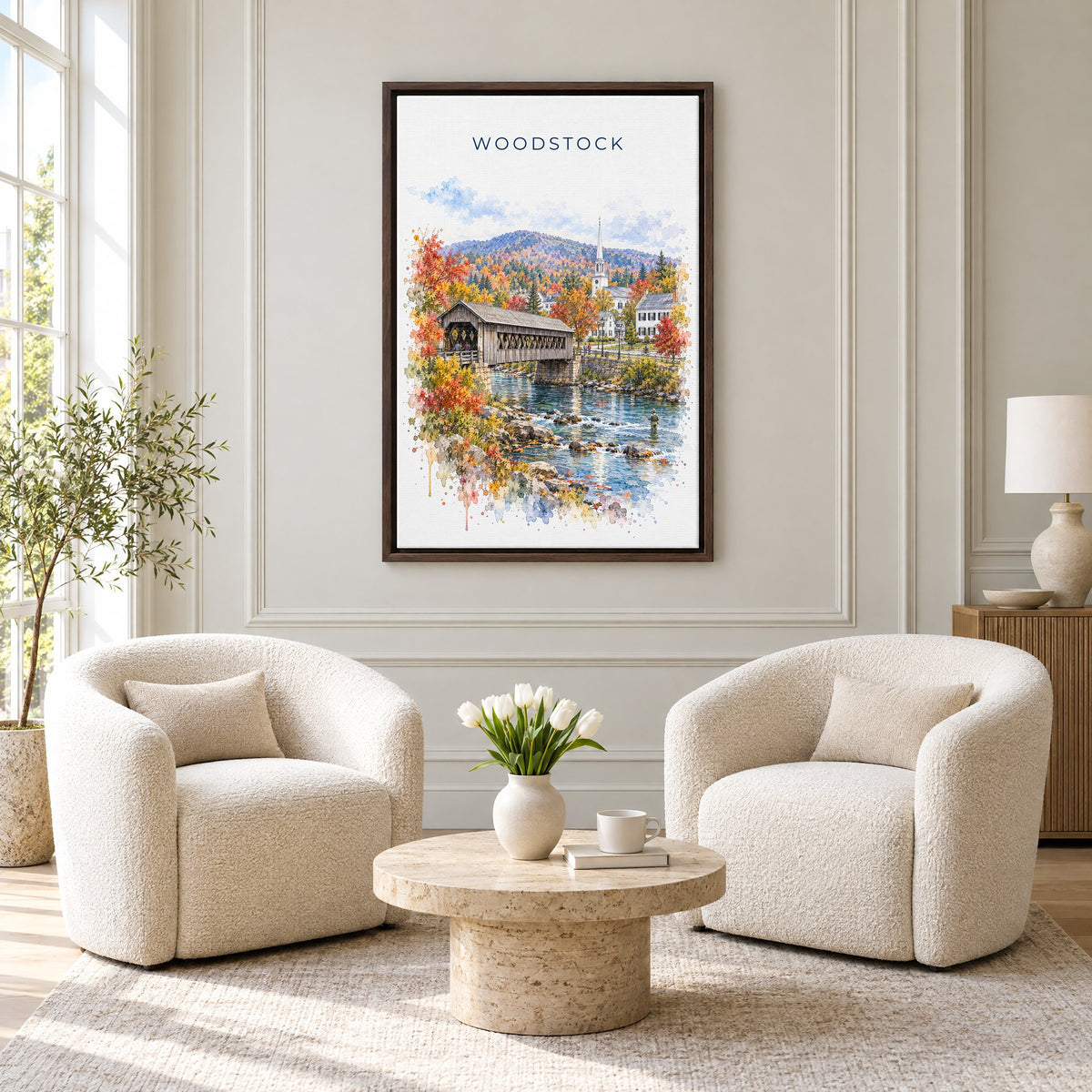 Woodstock, Vermont watercolor print as an espresso floater canvas above two boucle armchairs in a hotel lounge