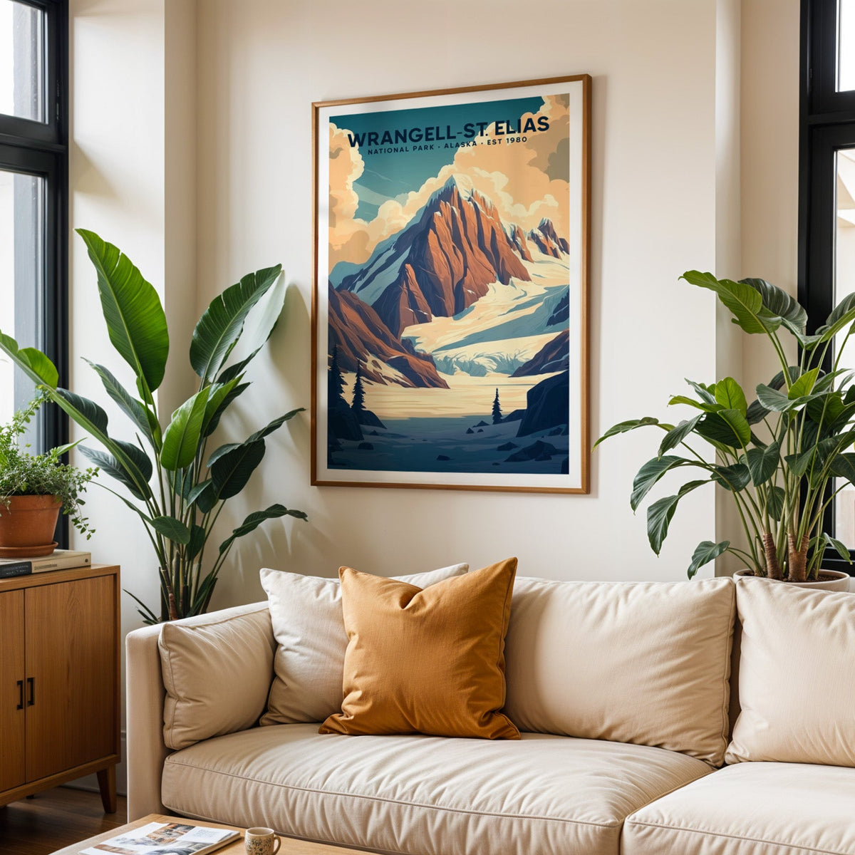 Wrangell–St. Elias National Park print in an oak frame above a cream sofa with an ochre cushion