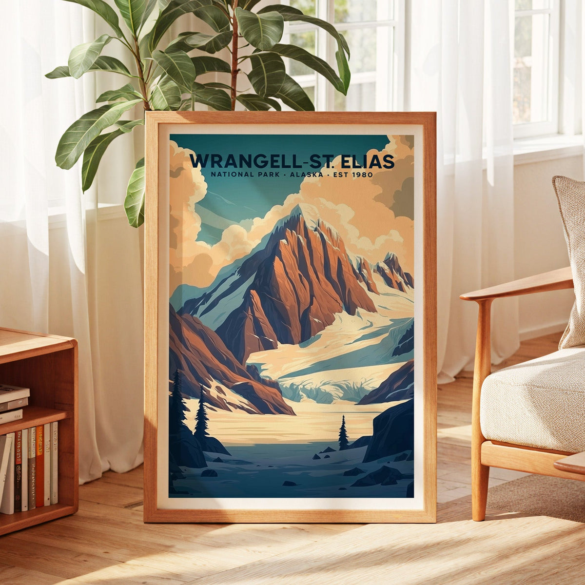 Wrangell–St. Elias National Park print in an oak frame by a sunlit window with a fig plant