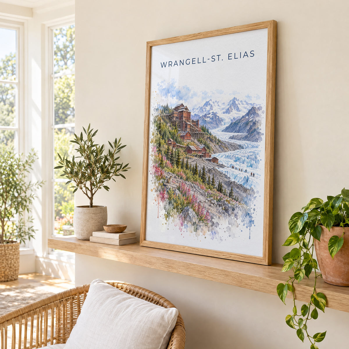 Wrangell-St. Elias National Park watercolor print in an oak frame on a picture ledge in a sunlit sunroom