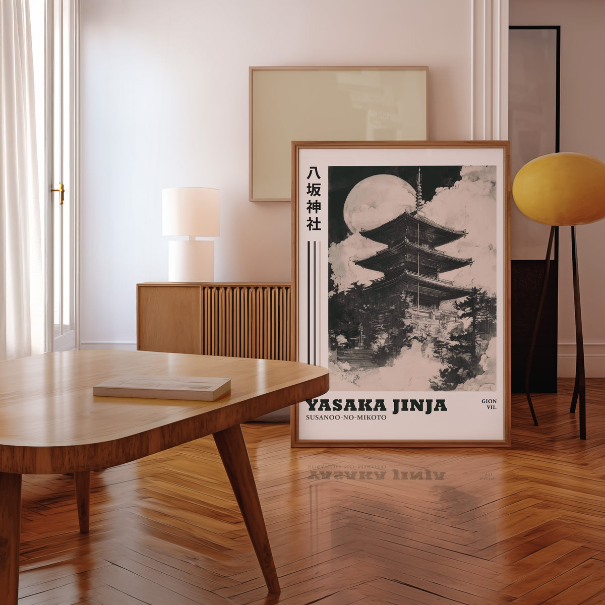 Sumi-e Yasaka pagoda and full moon print in a walnut frame leaning in a mid-century living room