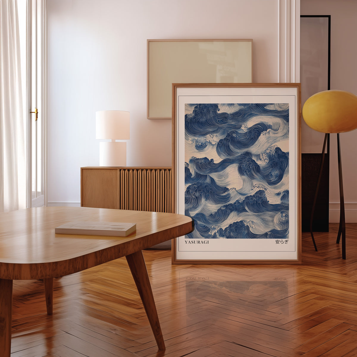 Indigo woodblock Yasuragi waves print in a walnut frame leaning in a mid-century living room