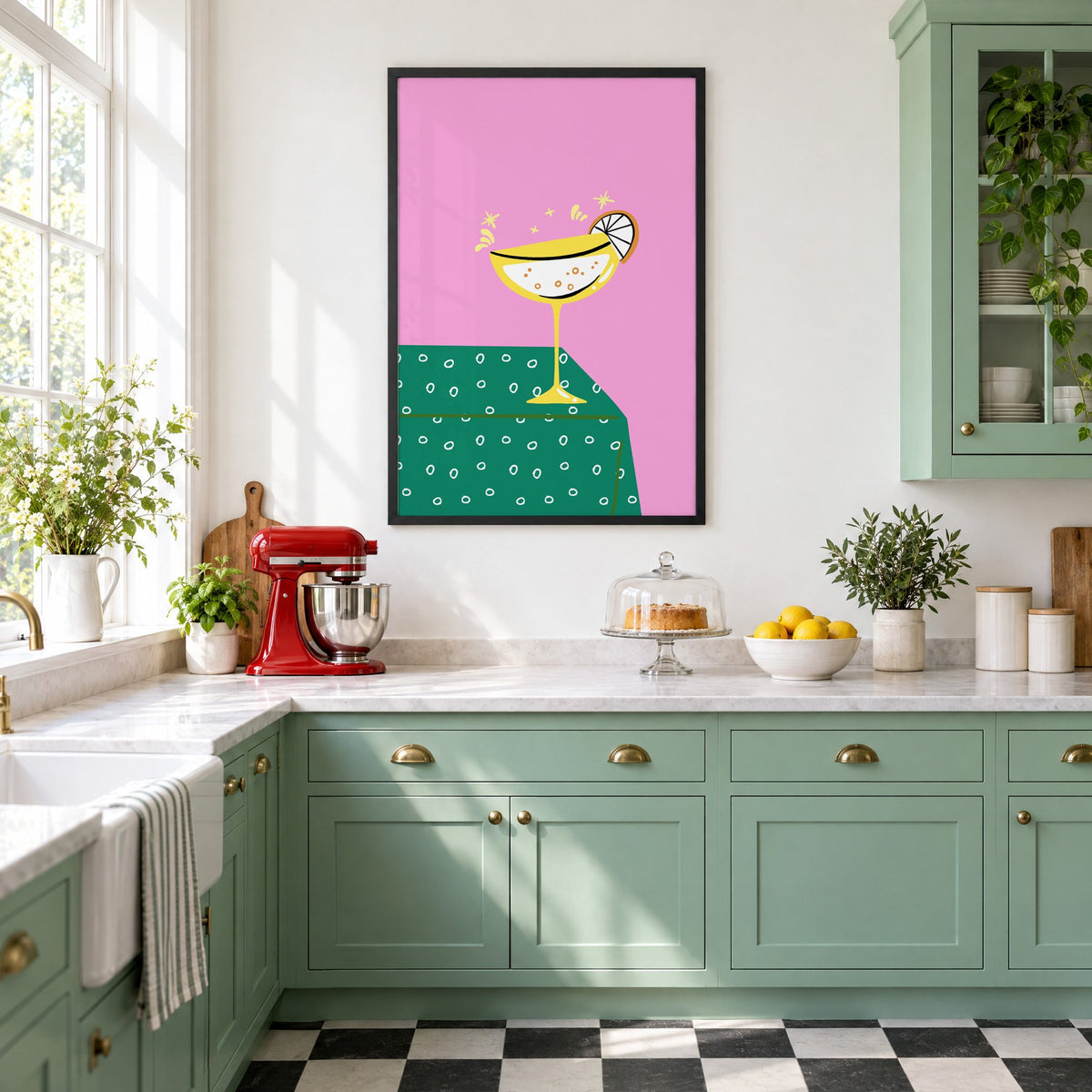 Yellow coupe cocktail print in a black frame in a mint green retro kitchen above a red stand mixer