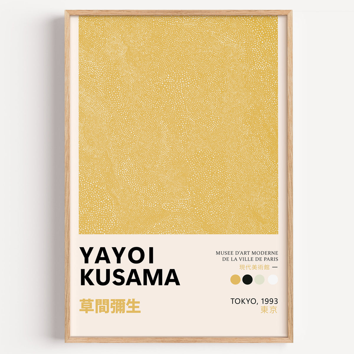 Yayoi Kusama inspired yellow dotted texture print in a wood frame on a plain wall