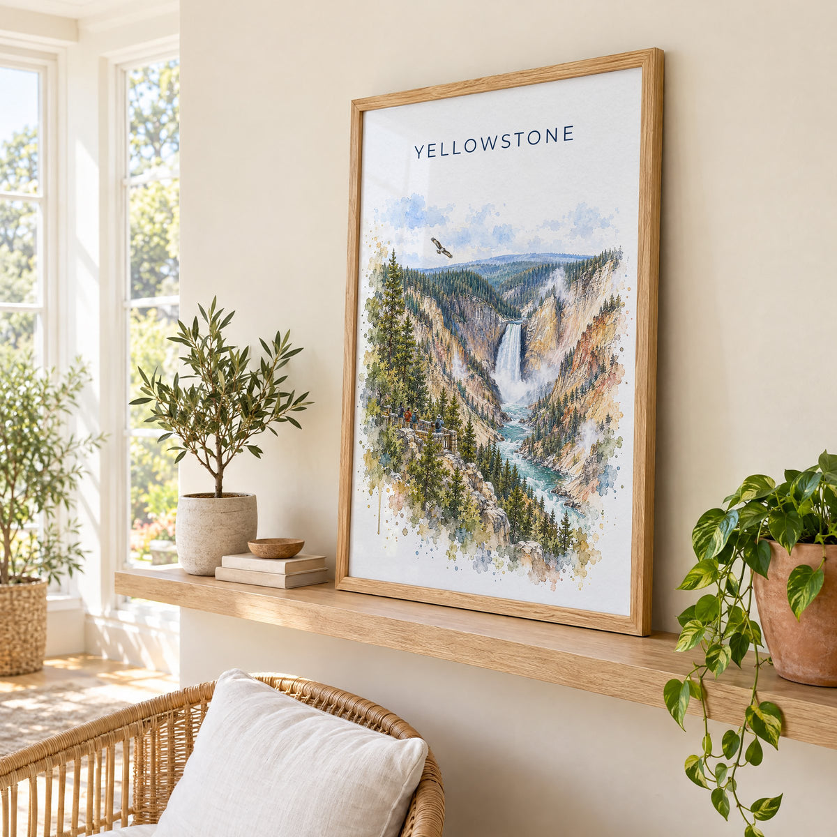 Yellowstone National Park watercolor print in an oak frame on a picture ledge in a sunlit sunroom