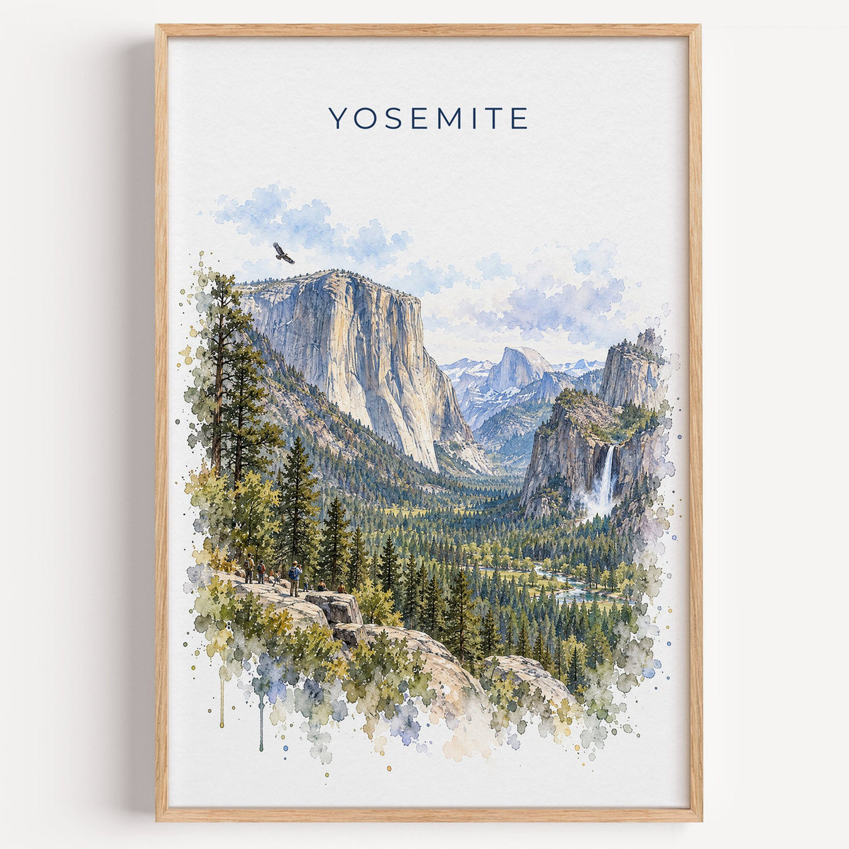 Yosemite National Park watercolor print in a light oak frame on a plain white wall