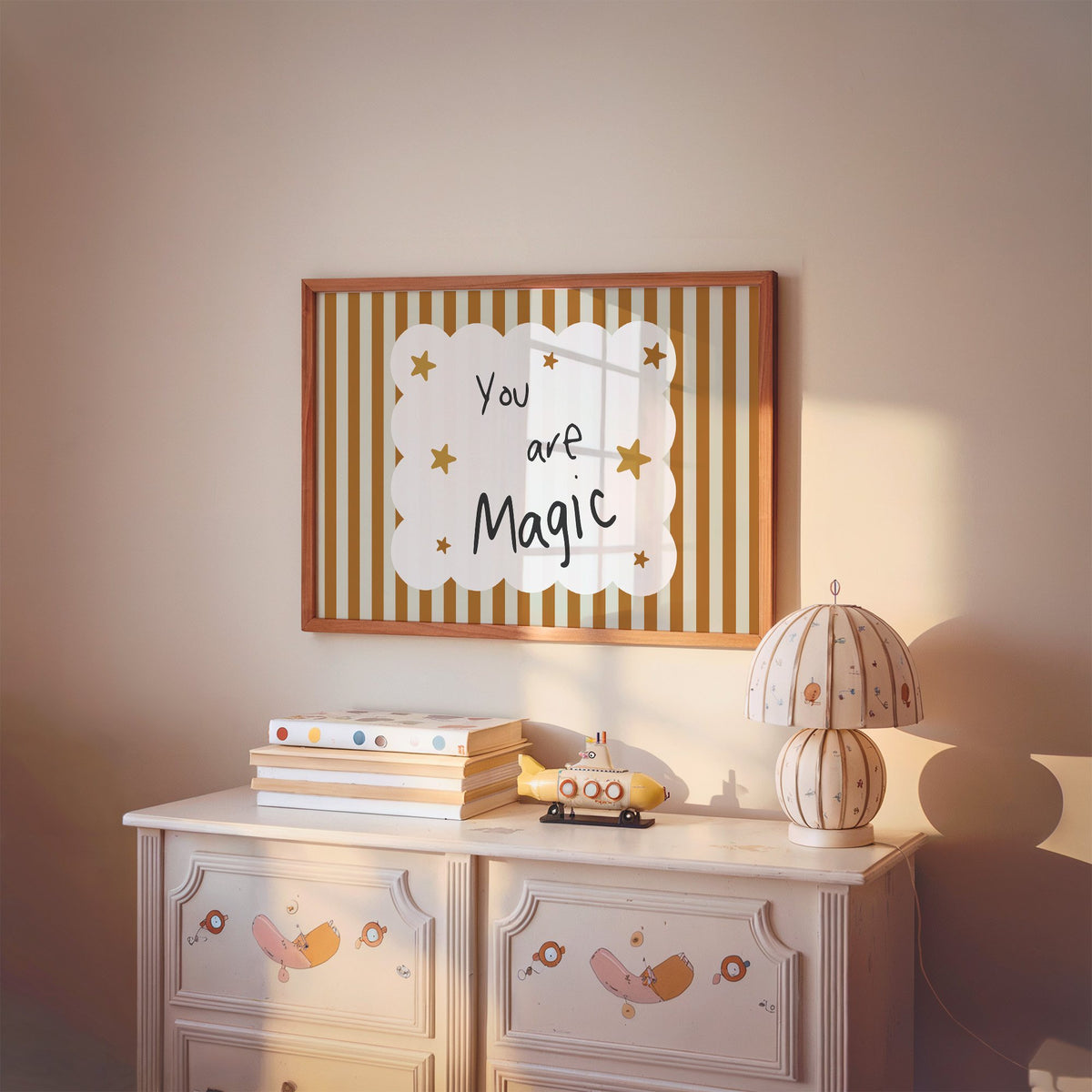 Landscape you are magic stars nursery print in a cherry wood frame above a painted dresser and lamp