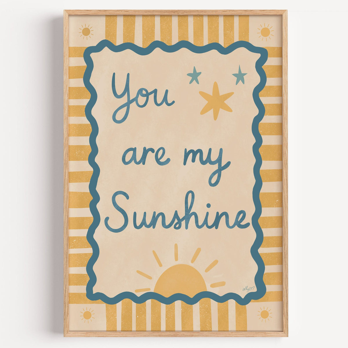 You are my sunshine wavy frame nursery print in a light oak frame on a plain white wall