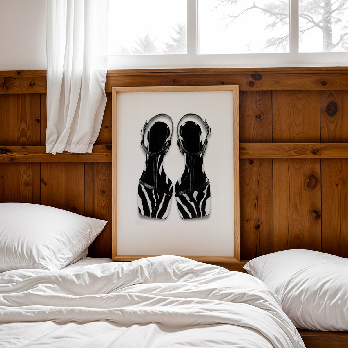 Zebra stripe T-strap sandals on white print in a pine frame leaning on a wood headboard over white bedding