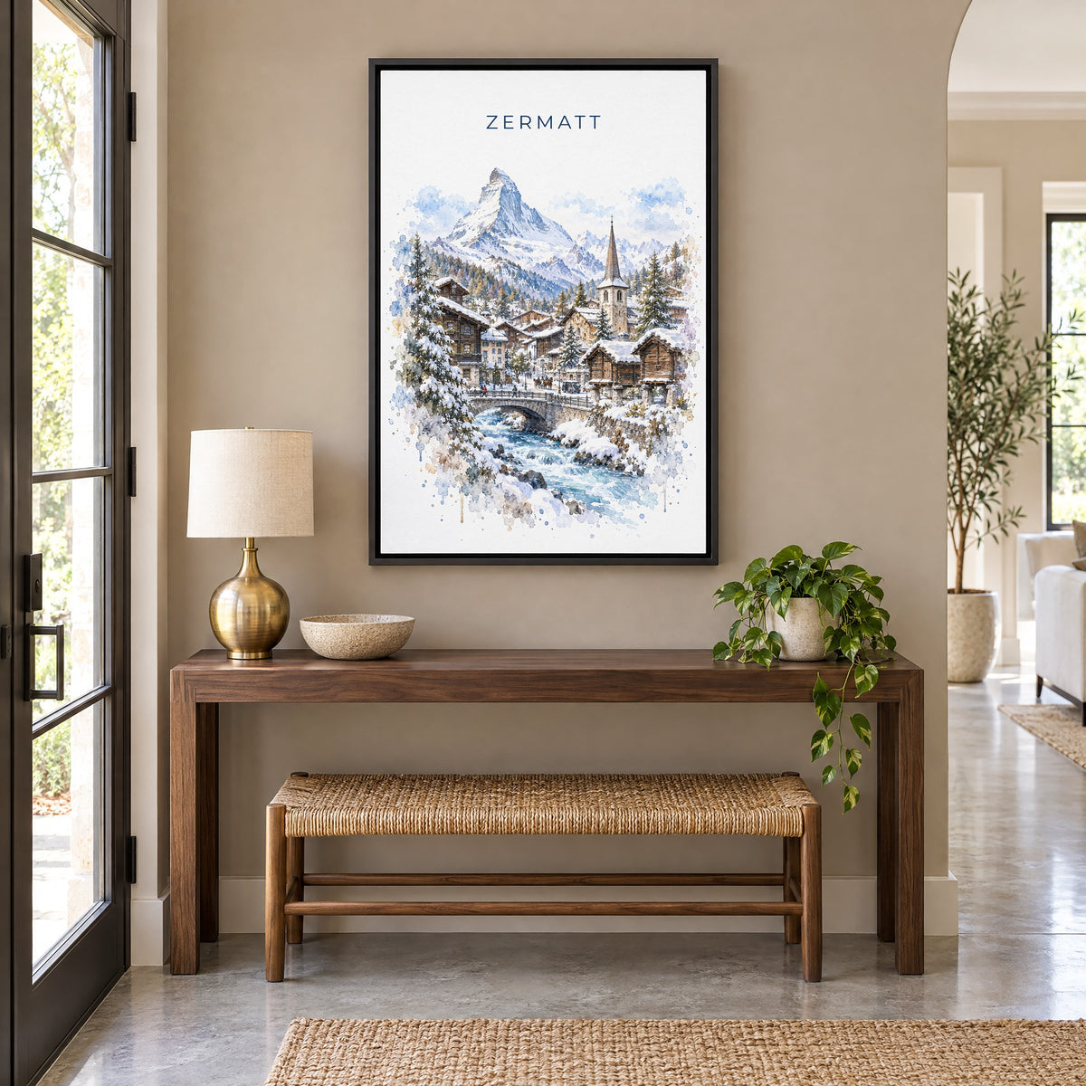 Zermatt watercolor print as a black floater canvas above a walnut console and woven bench in an entryway