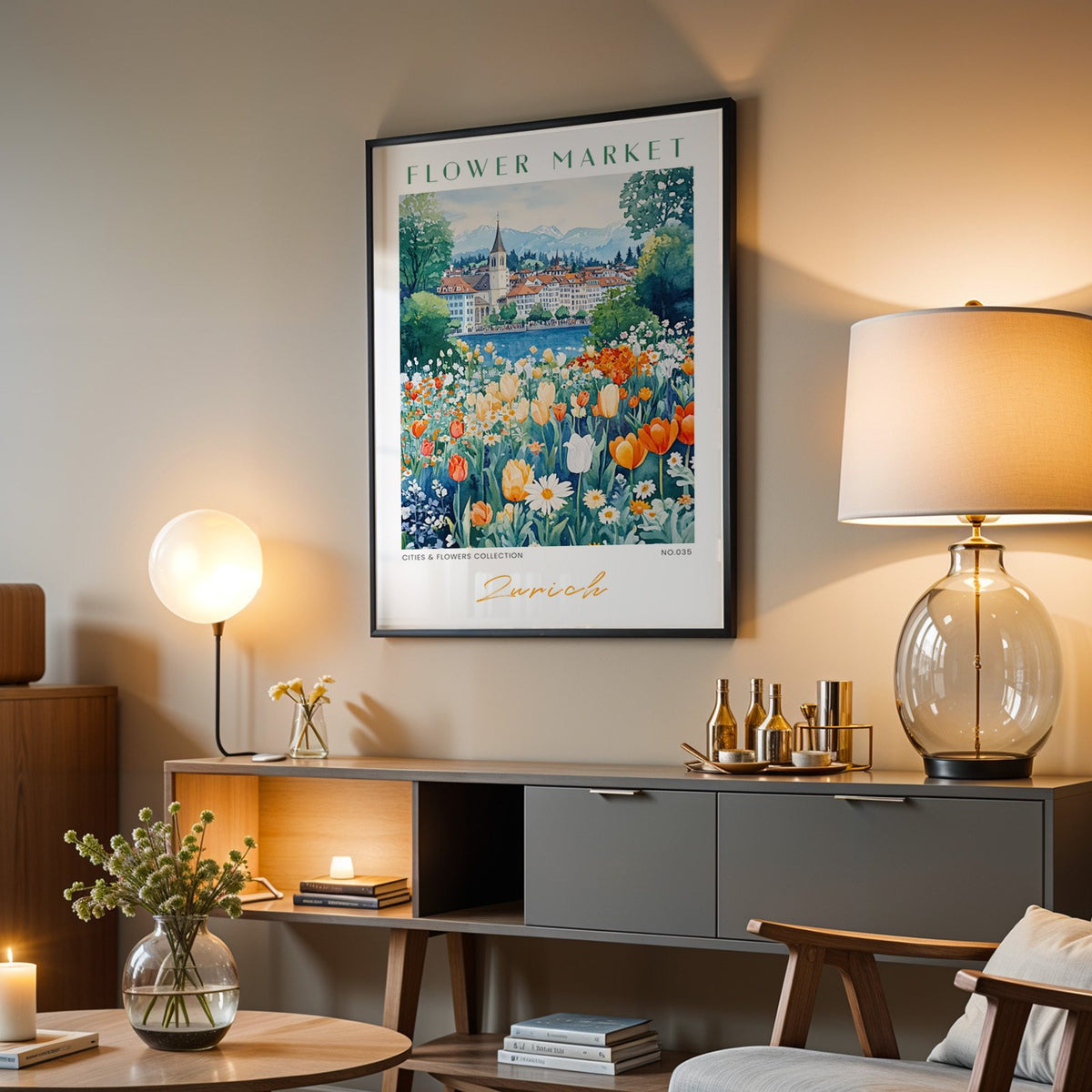 Zurich flower market print in a black frame above a grey media console with a glass table lamp