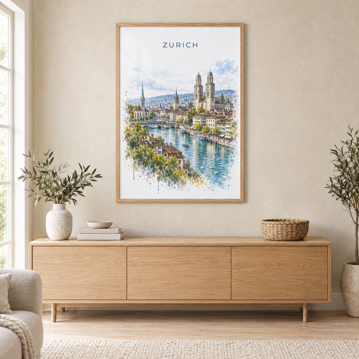 Zurich watercolor print in an oak frame above a light wood sideboard in a Scandinavian living room